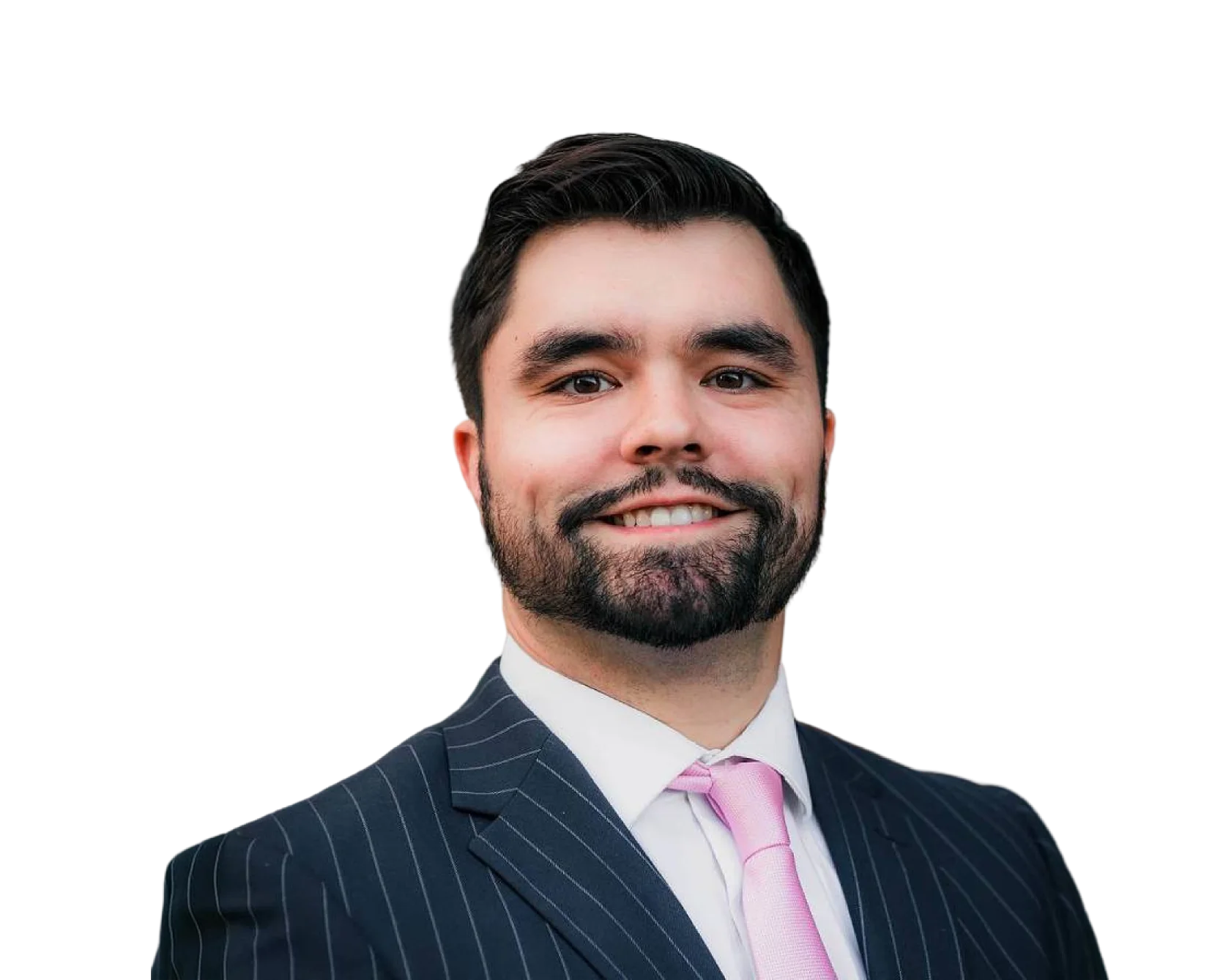 Jeremy Best in a dark pinstripe suit and a pink tie