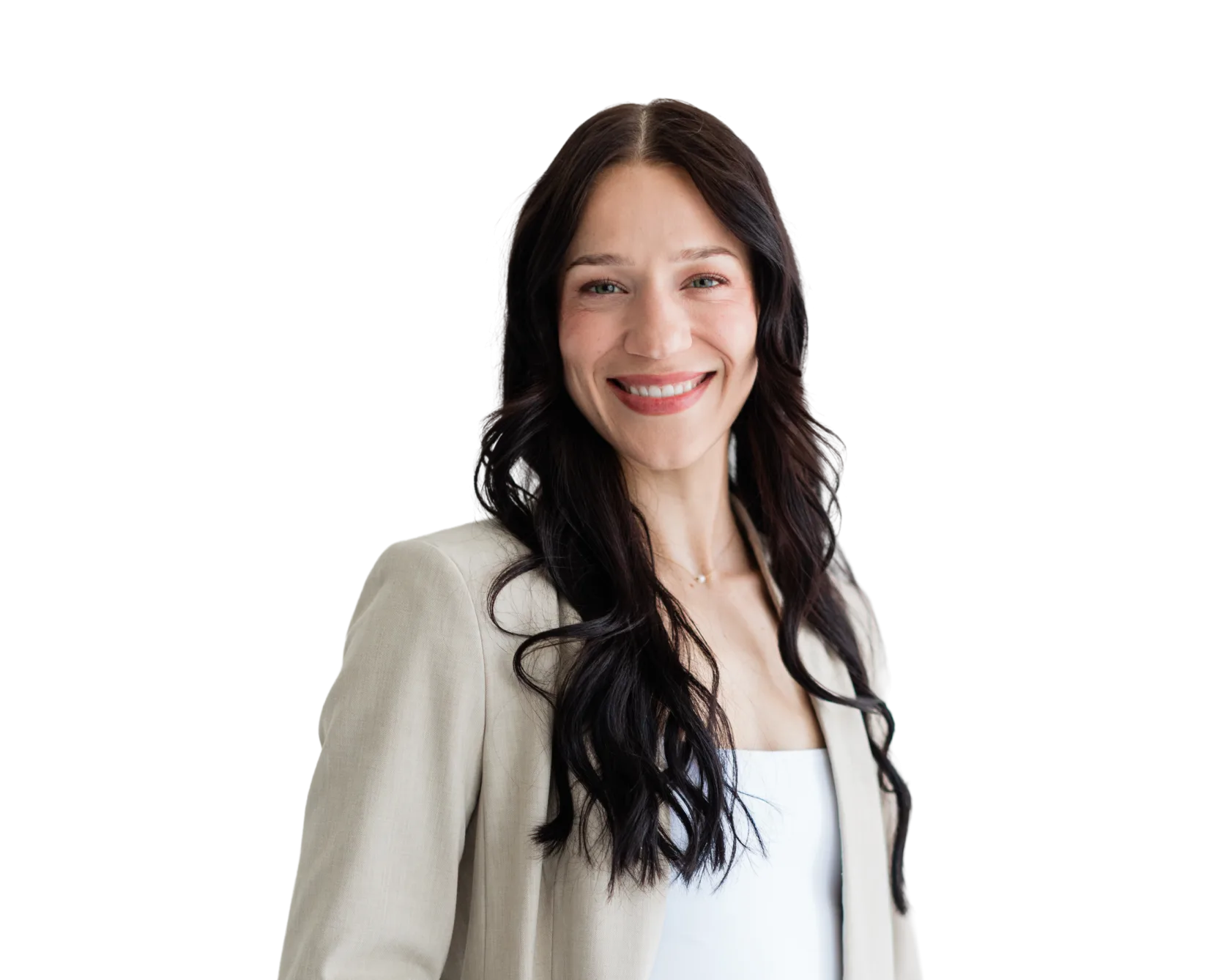 Kyra Falcone in a beige blazer over a white top
